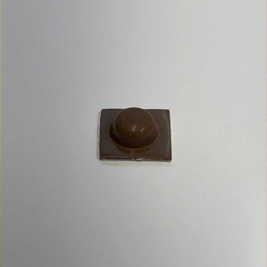 Self adhesive buttons