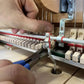 Pince pour plombs de mécanique d’étouffoirs