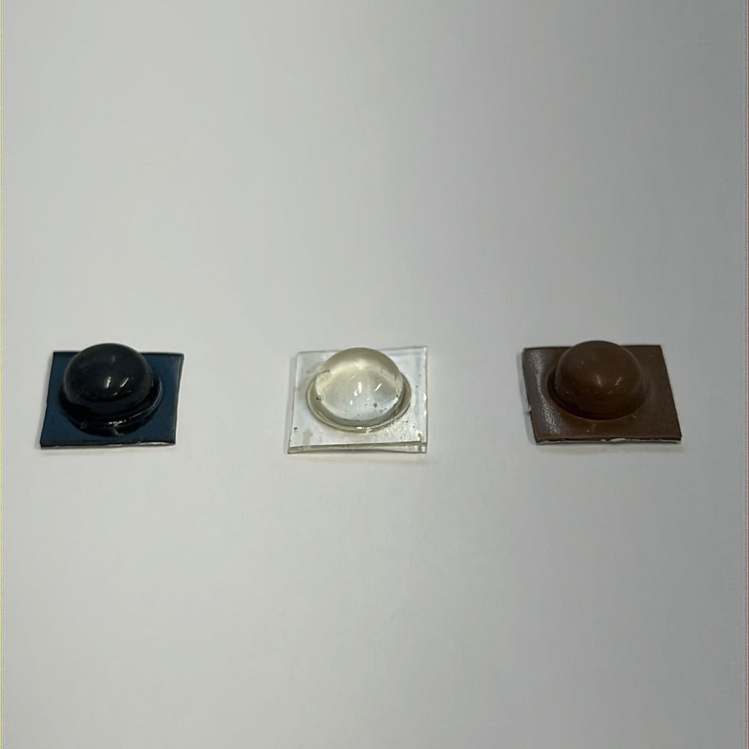 Self adhesive buttons
